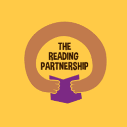 Logo with text "The Reading Partnership" inside a circular shape formed by arms holding a book.